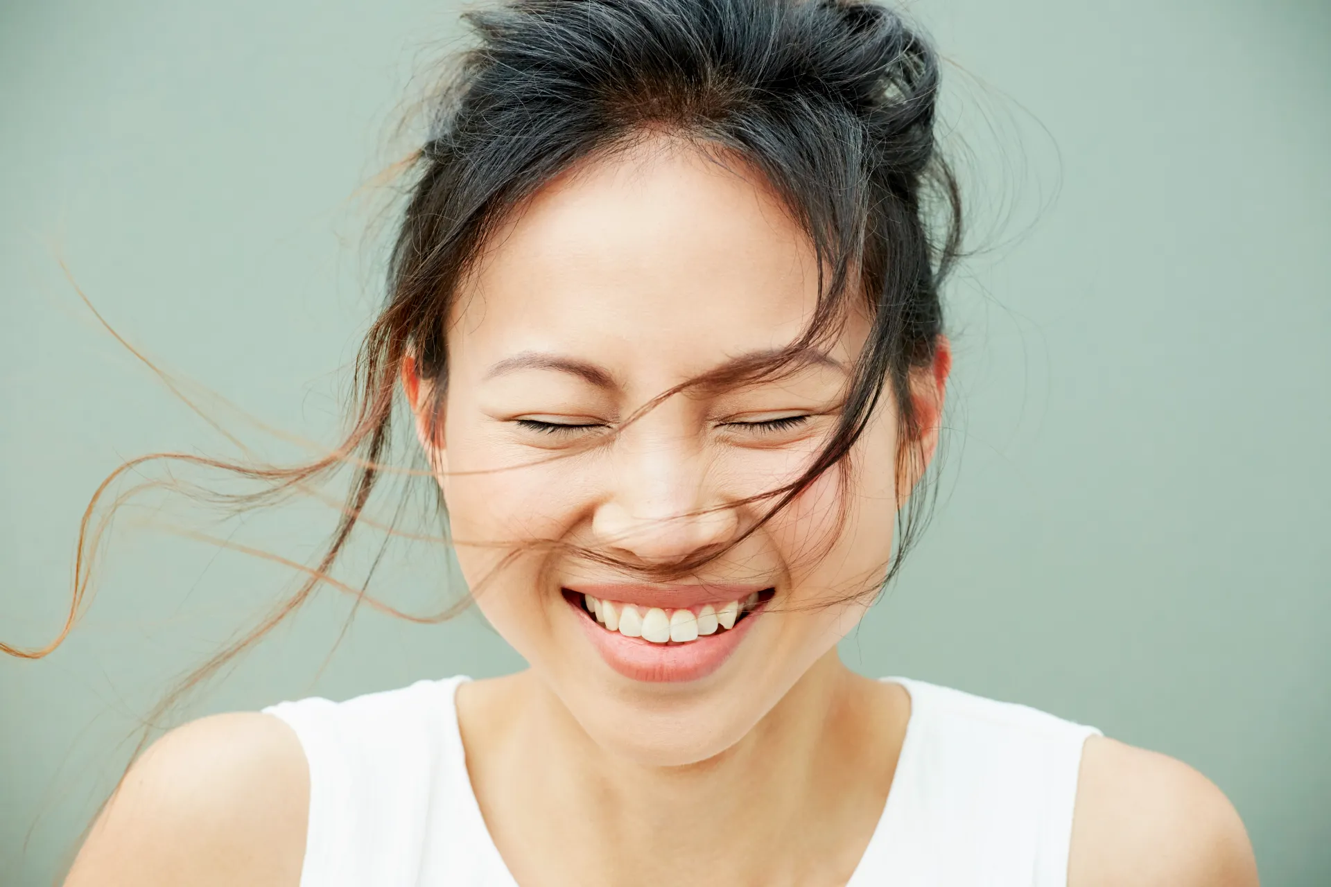 portrait of woman laughing utc